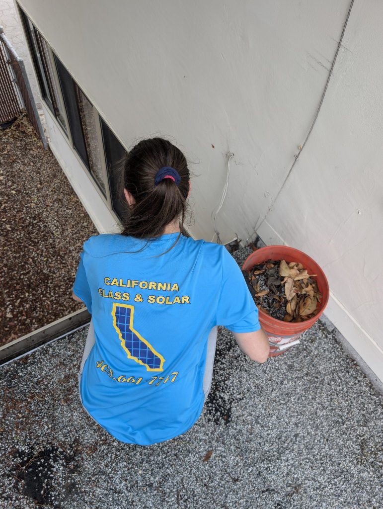 Roof debris cleanup, California Glass and Solar crew